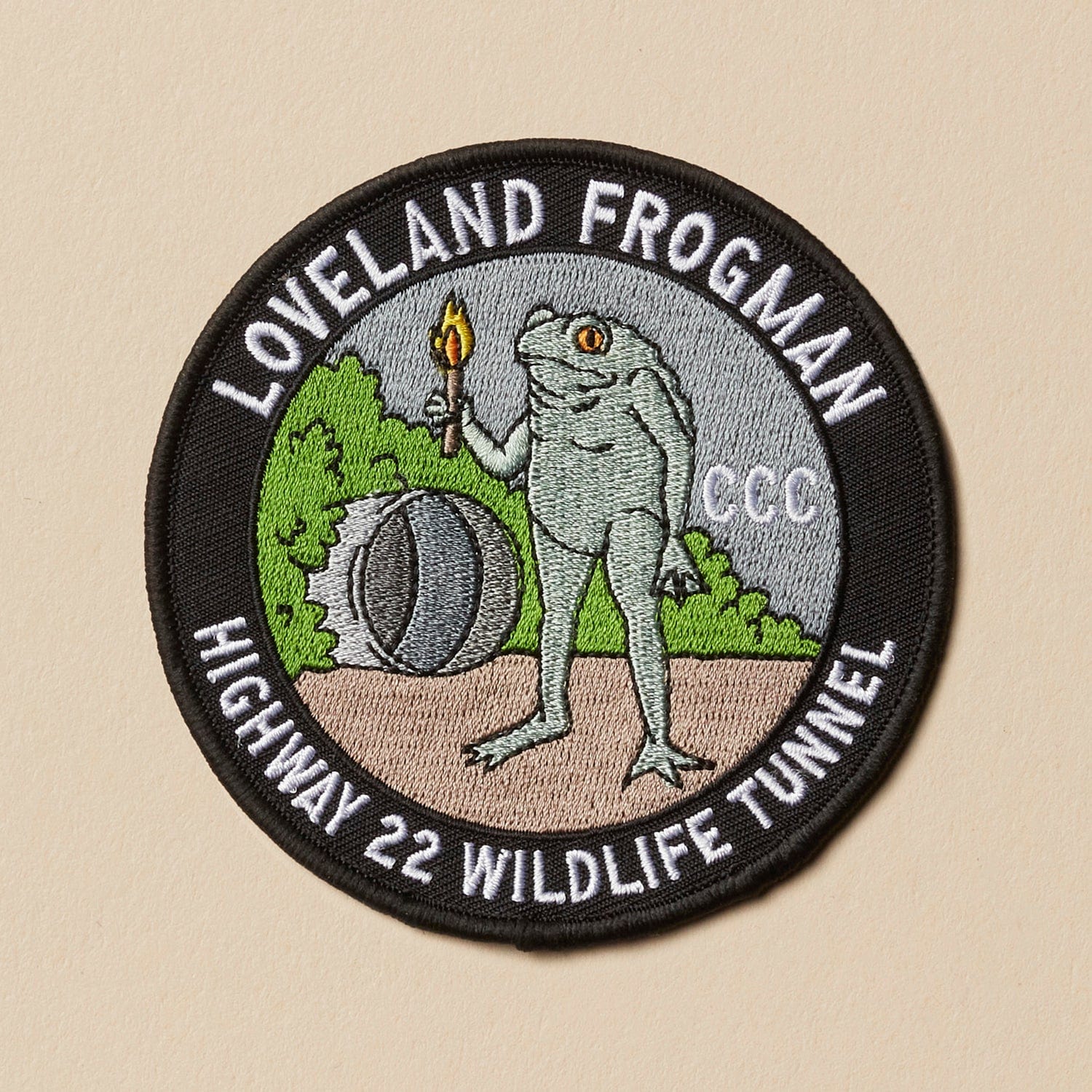 Loveland Frogman Wildlife Tunnel Set: Pin, Sticker, and Patch - Image 3